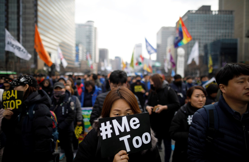 People attend a protest as a part of the #MeToo movement on the International Women's Day in Seoul, South Korea, March 8, 2018 (photo credit: REUTERS/KIM HONG-JI)