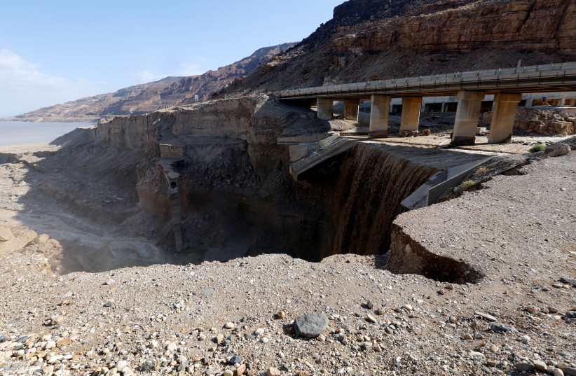 A general view shows the location of the accident where rain storms unleashed flash floods, near the Dead Sea, Jordan October 26, 2018 (photo credit: MUHAMMAD HAMED/REUTERS)