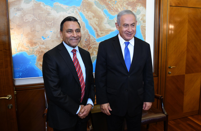 Harman President and CEO Dinesh Paliwal and Prime Minister Benjamin Netanyahu (photo credit: OREN TESLER)