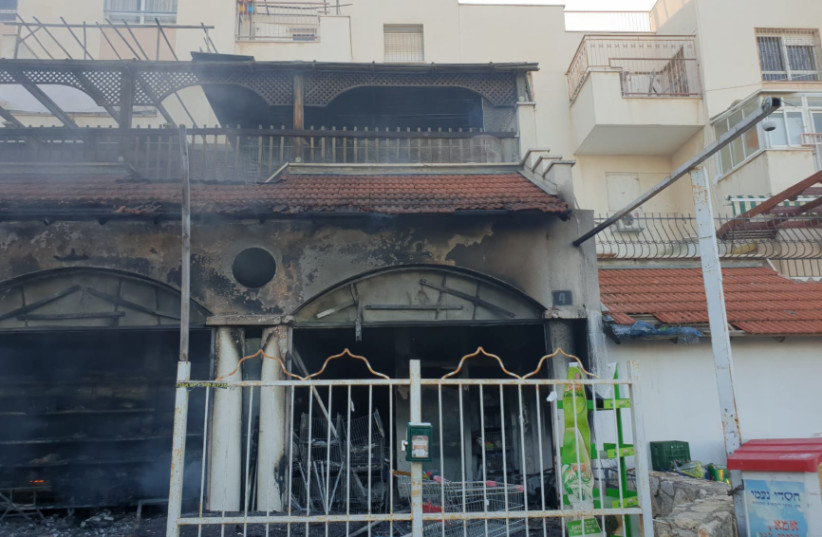 Fire burns through store in Beit Shemesh (photo credit: MAARIV)