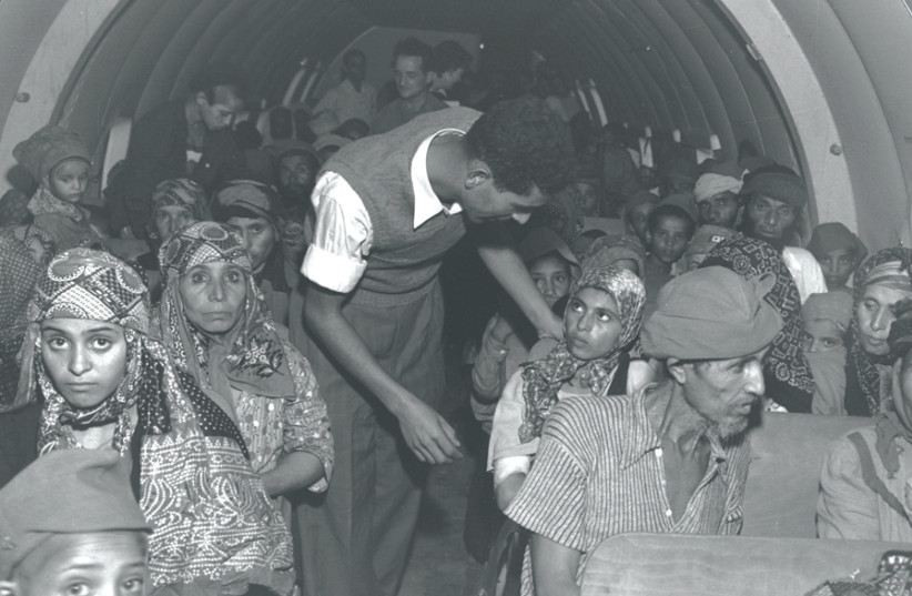 Yemenite immigrants on a plane flying to Lod Airport from Aden on October 23, 1949 (photo credit: TEDDY BRAUNER/GPO)