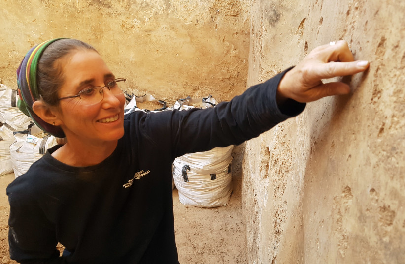 Dr. Davida Eisenberg-Degen from the Israel Antiquities Authority in a cistern in Beer Sheva (photo credit: Israel Antiquities Authority)