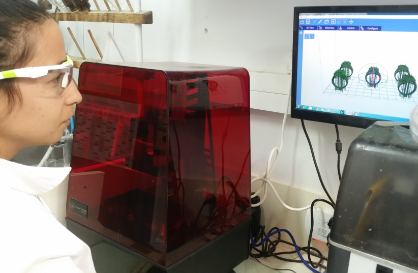 Researchers at Hebrew University's 3D and Functional Printing Center (photo credit: Courtesy)