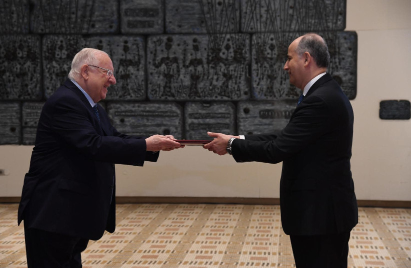 President Rivlin accepts a letter of credence from Jordanian ambassador Ghassan Majali (photo credit: HAIM ZACH/GPO)