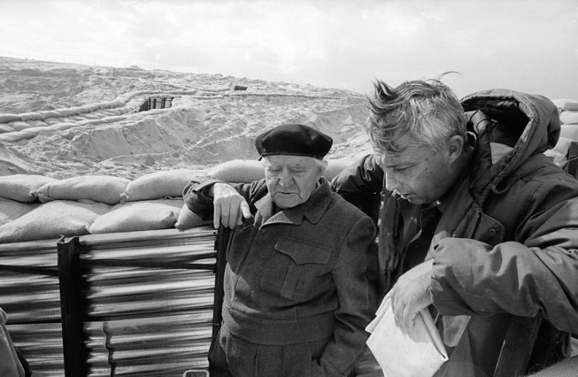 PRIME MINISTER David Ben-Gurion (left) and IDF Southern Command head Ariel Sharon survey the Bar Lev defense line in the Sinai Peninsula. (photo credit: DAVID RUBINGER)