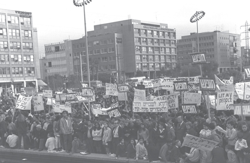 UNIVERSITY STUDENTS take part in a mass rally in Tel Aviv in 1969 in support of the Jews of the Soviet Union. (photo credit: MOSHE MILNER / GPO)