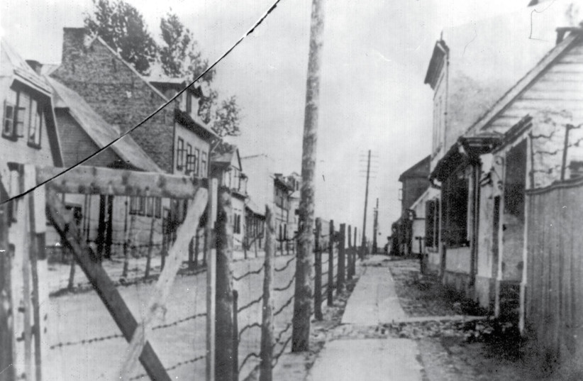 A barbed wire fence along Panrow Street separating the two parts of the Kovnia ghetto in Lithuaia (photo credit: YAD VASHEM PHOTO ARCHIVES)