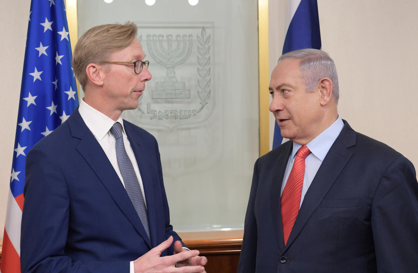 Prime Minister Benjamin Netanyahu meets with US envoy Brian Hook (photo credit: AMOS BEN-GERSHOM/GPO)