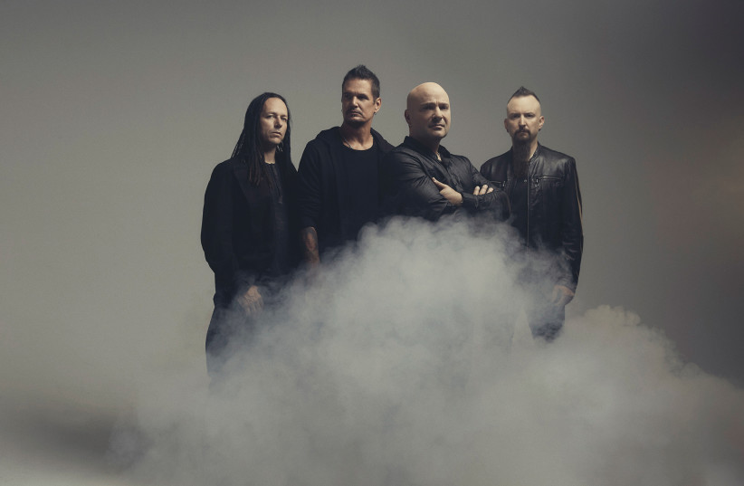 DISTURBED, WITH David Draiman (third from left), are on the way to Israel.  (photo credit: Courtesy)