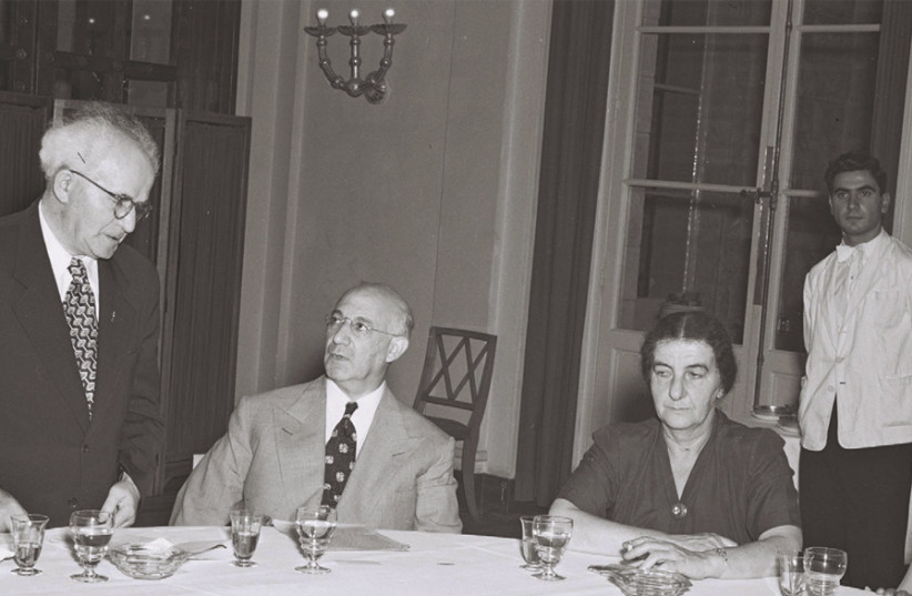 Prime Minister David Ben-Gurion addresses a luncheon at the King David Hotel in honor of industrialist Jacob Blaustein, attended by ministers Golda Meir and Moshe Sharett on August 23, 1950 (photo credit: GPO)