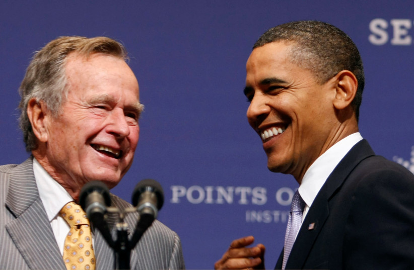 US President Barack Obama is introduced to speak by former President George H.W. Bush at the Points of Light forum at Texas A&M University in College Station, Texas October 16, 2009 (photo credit: KEVIN LAMARQUE/REUTERS)