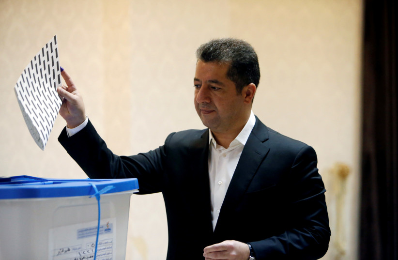 Iraqi Kurdish security chief Masrour Barzani, casts his vote, during parliamentary elections in the semi-autonomous region, on the outskirts of Erbil, Iraq September 30, 2018.  (photo credit: REUTERS/AZAD LASHKARIG)