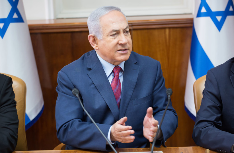 Prime Minister Benjamin Netanyahu at the ministerial committee on violence against women, December 5, 2018 (credit: EMIL SALMAN/HAARETZ)