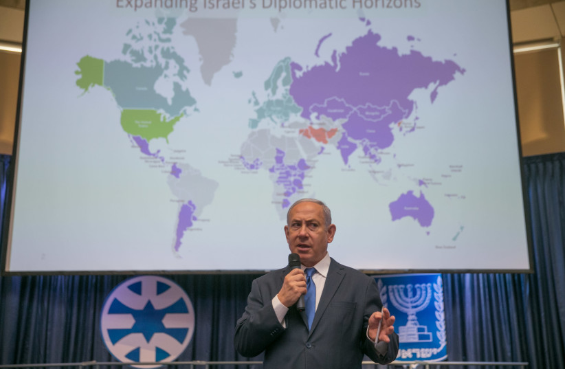 Prime Minister Benjamin Netanyahu address a diplomatic conference, December 10th, 2018 (photo credit: OHAD TZVEIGENBERG‏/POOL)