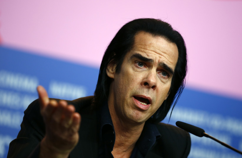 Cast member Nick Cave talks during a news conference promoting the movie "20,000 Days on Earth" at the 64th Berlinale International Film Festival in Berlin February 10, 2014 (photo credit: REUTERS/THOMAS PETER)