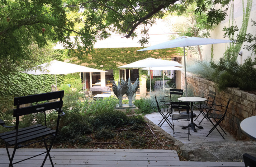 CAFÉ BICKELS in the sculpture garden is named for architect Samuel Bickels, who designed Ein Harod’s art center. (photo credit: RON ARDEH)