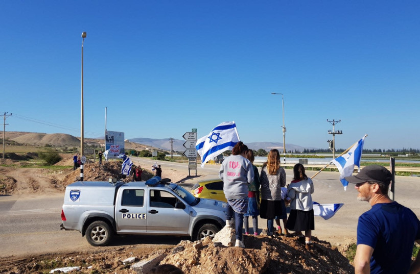 Dozens of demonstrators protested at the Mehola Junction in the Jordan Valley (photo credit: MATI CARMI/TPS)