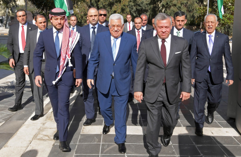 Jordan's King Abdullah II (R), his son Crown Prince Hussein (L) and Palestinian president Mahmoud Abbas meet in Amman ahead of the churches' celebrations of Christmas on December 18, 2018 (photo credit: AFP PHOTO / PPO / THAER GHANAIM)