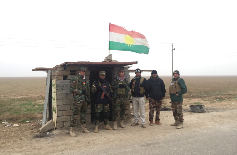 ROJAVA PESHMERGA troops guard a road in northern Iraq in December 2015. (photo credit: SETH J. FRANTZMAN)