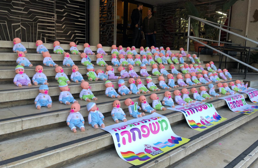 Baby dolls placed in front of the Jabotinsky House in Tel Aviv in protest of the state's opposition to surrogacy law, December 19, 2018 (photo credit: Courtesy)