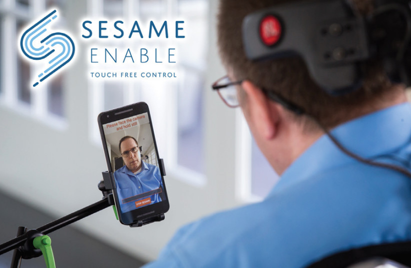 A person with ALS uses the Sesame Enable application to operate his smartphone hands-free. (photo credit: Courtesy)