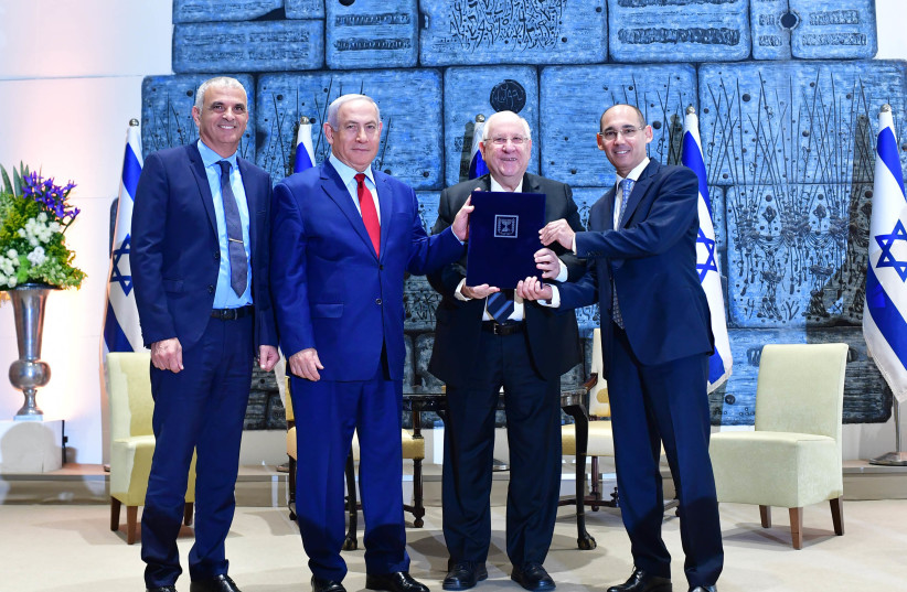 Finance Minister Moshe Kahlon, Prime Minister Benjamin Netanyahu, President Reuven Rivlin and Governor of the Bank of Israel Amir Yaron (left to right) (photo credit: GPO)