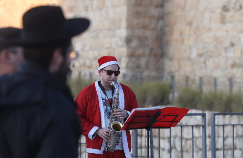 Christmas in Jerusalem's Old City (photo credit: MARC ISRAEL SELLEM/THE JERUSALEM POST)
