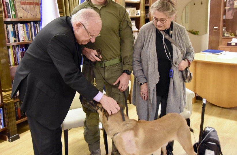 President and Mrs Rivlin welcomed soldiers from the Police counter-terrorism unit and Rambo the dog, who were involved in the capture of the terrorist responsible for the attack at Barkan industrial estate (photo credit: TOMER REICHMAN/COURTESY)