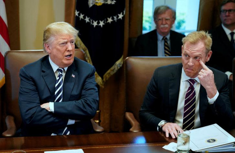 U.S. President Donald Trump, flanked by Deputy Secretary of Defense Patrick Shanahan, holds a cabinet meeting at the White House in Washington. (photo credit: REUTERS/JONATHAN ERNST)