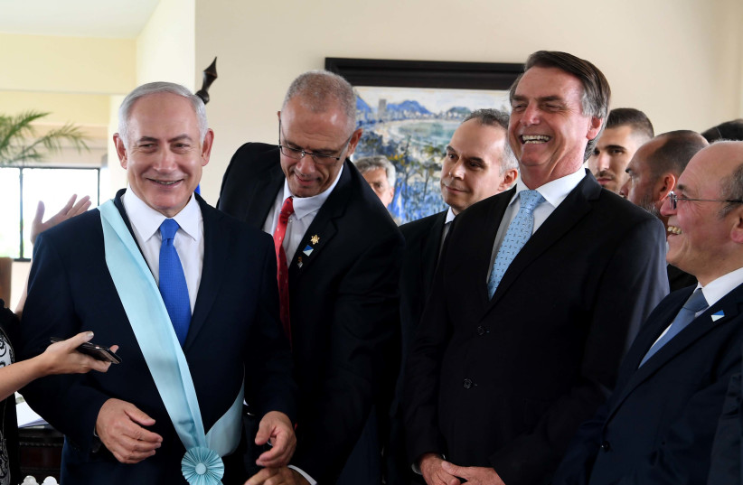 PM Netanyahu receives highest national decoration for visitors in Brazil. (photo credit: AVI OHAYON - GPO)