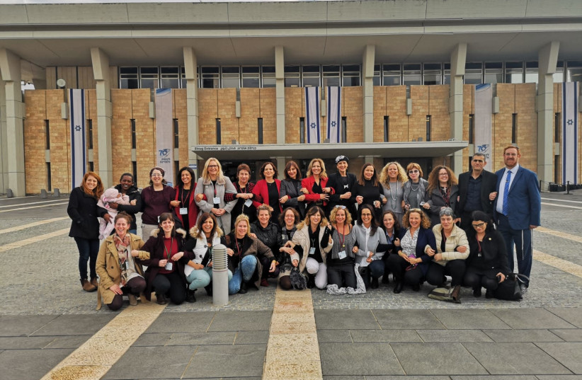 Representatives of women's rights NGOs and MKs after passage of Knesset law criminalizing the hiring of prostitutes, December 31, 2018 (photo credit: OFFICE OF MK SHULI MOALEM-REFAELLI)