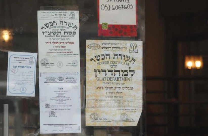 KASHRUT CERTIFICATION at a Jerusalem eatery – will the rabbinate’s monopoly be broken? (credit: MARC ISRAEL SELLEM)
