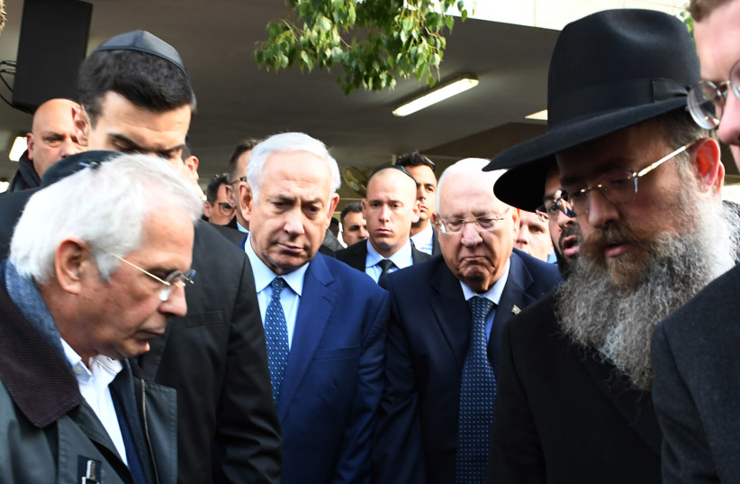 PM Netanyahu and President Rivlin attend the funeral of Moshe Arens. (photo credit: ARIEL HERMONI/DEFENSE MINISTRY)