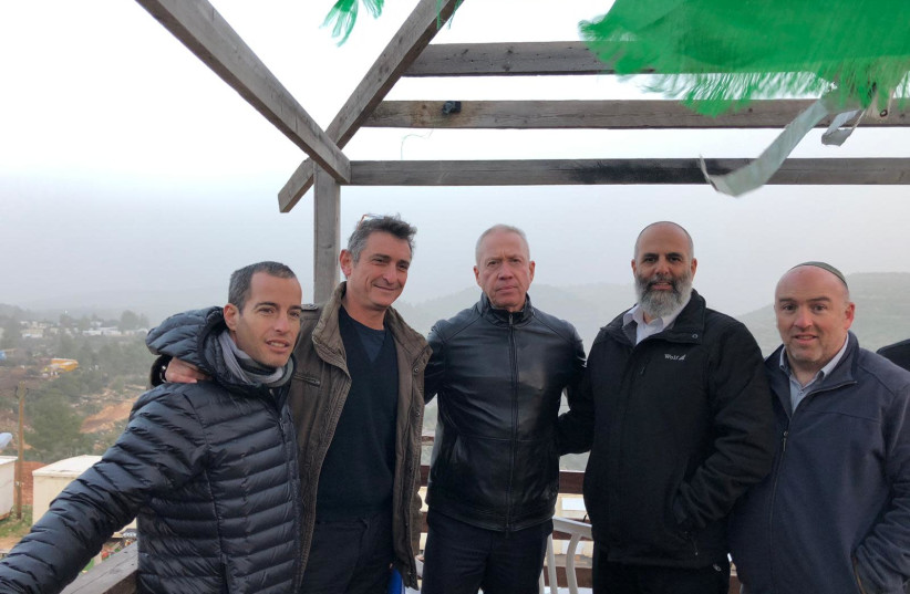 Yoav Galant (C) on a tour of the West Bank, January 13th, 2018 (photo credit: TAL KETKO)