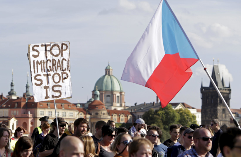 File photo of demonstrators marching during an anti-immigrants rally in Prague, Czech Republic, September 12, 2015 (photo credit: DAVID W. CERNY / REUTERS)