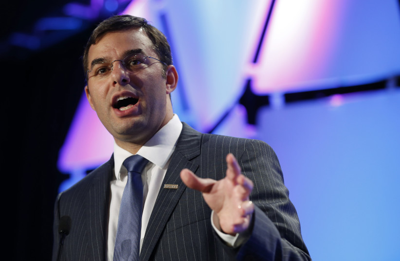 U.S. Rep. Justin Amash (R-MI) speaks at the Liberty Political Action Conference (LPAC) in Chantilly, Virginia September 19, 2013. (photo credit: REUTERS/KEVIN LAMARQUE)