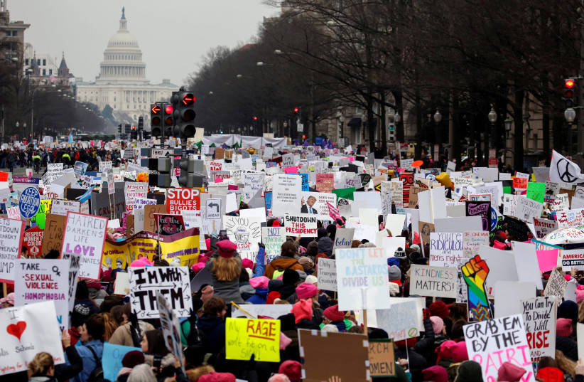 Thousands of people participate in Third Annual Women's March in Washington, US, January 19, 2019. (photo credit: REUTERS/JOSHUA ROBERTS)