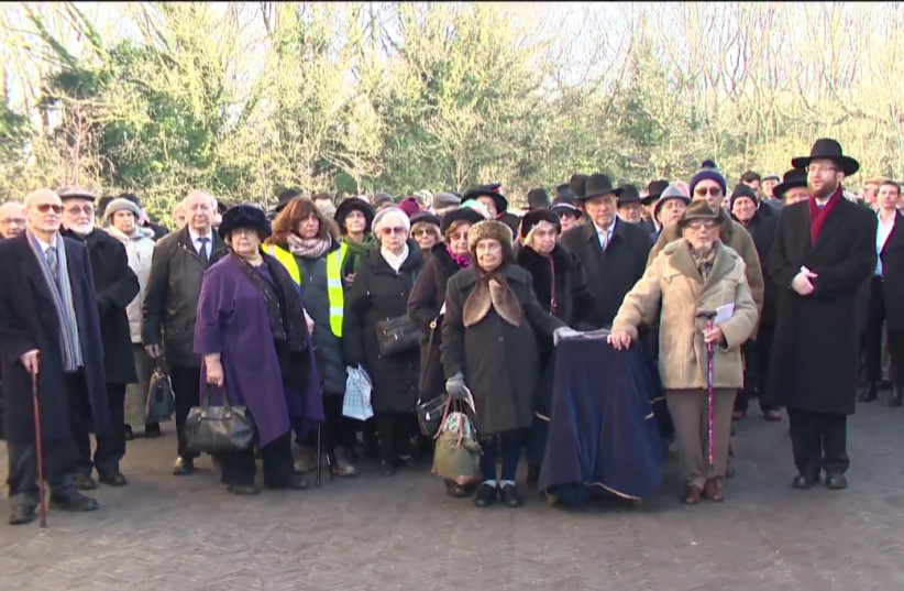 HOLOCAUST SURVIVORS accompany a coffin containing the remains of six Holocaust victims to its burial on Sunday in Bushey, UK (photo credit: screenshot)