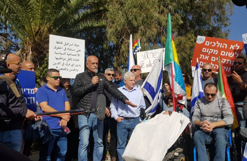  IDF Brig. Gen. (res.) Amal As’ad leads disabled Druze IDF soldiers in calling for the Nation-State Law to be amended, January 25, 2019 (photo credit: MAARIV)