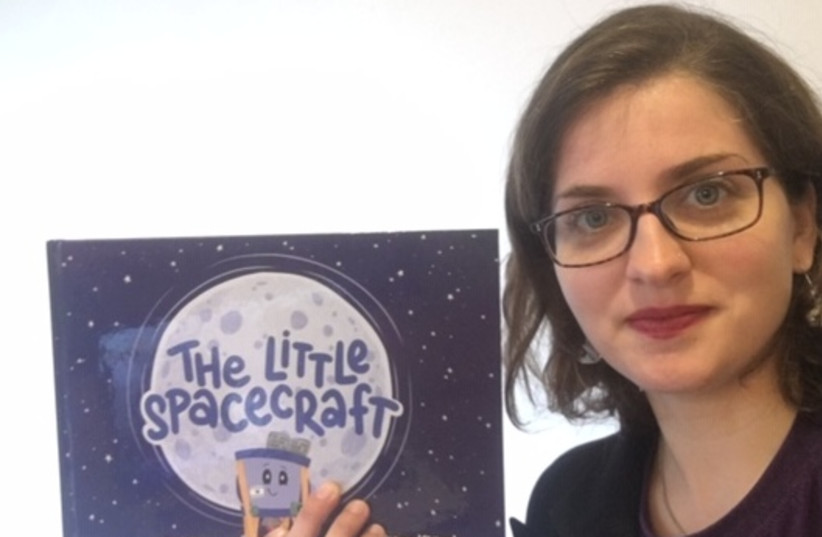 Dr. Yael Schuster, cofounder of StellarNova with her new book The Little Spacecraft (photo credit: Courtesy)