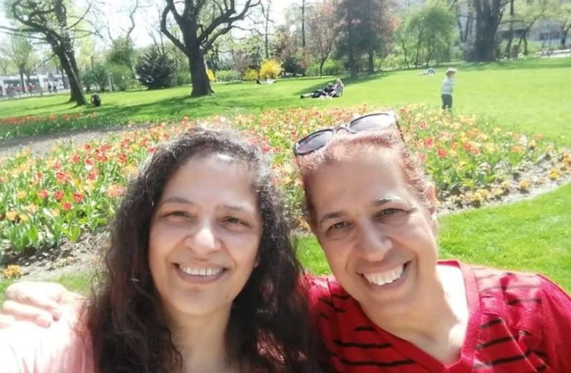 Israeli's Farhiya Sarusi, and aunt, Lily Pereg, in early February. The bodies of the two sisters were found in the yard of Gilad's house.  and Dr. Lily Pereg were murdered by their son and nephew in Argentina. (photo credit: screenshot)