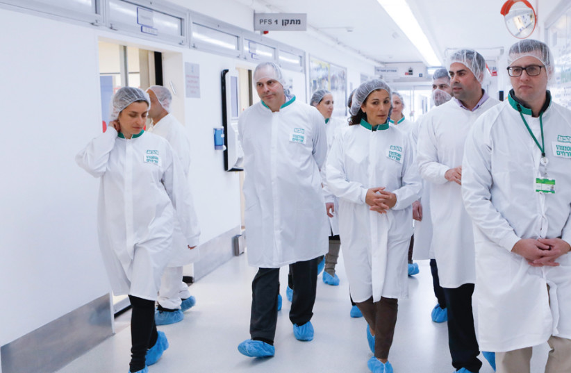 ISRAELI SCIENTISTS who reside overseas visit the Teva factory as part of a new project to encourage their return to Israel. (photo credit: ELAD MALKA)