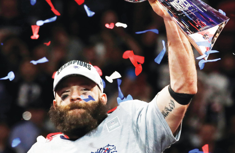 JULIAN EDELMAN became the first Jewish player to win a Super Bowl MVP on Sunday, with his 10 receptions for 141 yards propelling the New England Patriots to a 13-3 victory over the Los Angeles Rams.  (photo credit: REUTERS)
