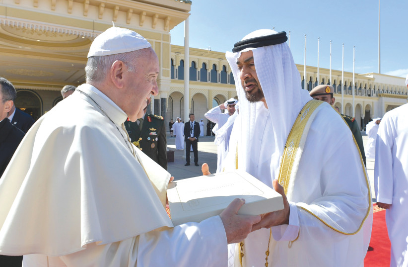 POPE FRANCIS talks with Abu Dhabi’s Crown Prince Mohammed bin Zayed Al-Nahyan during a farewell ceremony before leaving Abu Dhabi earlier this week (photo credit: REUTERS)