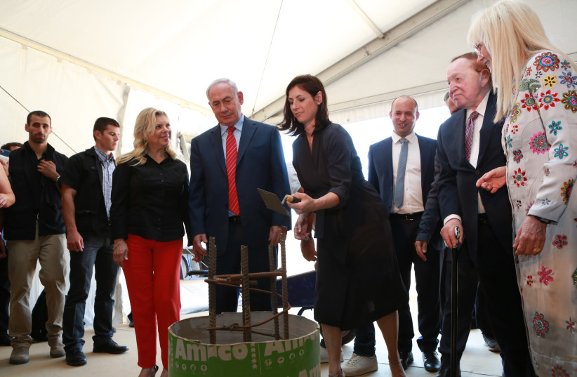 Prime Minister Benjamin Netanyahu and his wife Sara at a ceremony for the medical school in 2017 (photo credit: REUTERS)