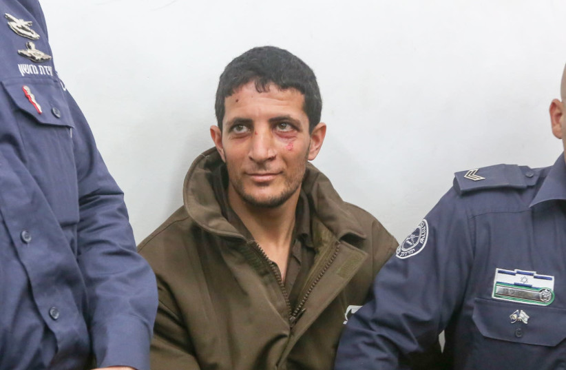 Arafat Irfaiya, Ori Ansbacher's murderer, brought to court (photo credit: MARC ISRAEL SELLEM/THE JERUSALEM POST)