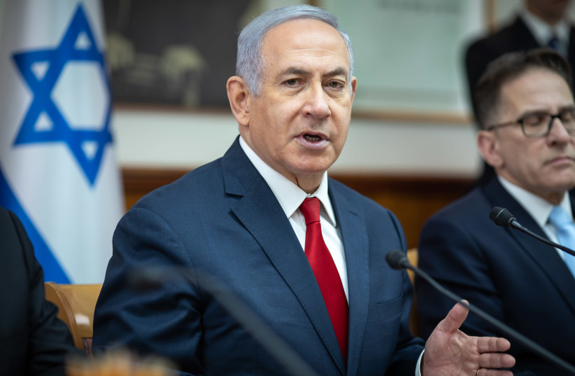 Prime Minister Benjamin Netanyahu speaks at a cabinet meeting, February 17th, 2019 (photo credit: EMIL SALMAN/POOL)