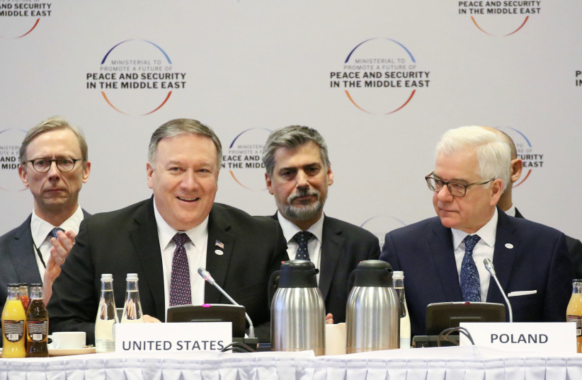 U.S. Secretary of State Mike Pompeo and Polish Foreign Minister Jacek Czaputowicz attend a plenary session at the Middle East summit in Warsaw, Poland, February 14, 2019 (photo credit: AGENCJA GAZETA/SLAWOMIR KAMINSKI VIA REUTERS)