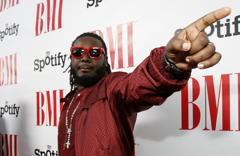 T-Pain poses as he arrives at BMI?s annual Urban Music Awards at the Saban theatre in Beverly Hills (photo credit: MARIO ANZUONI/REUTERS)