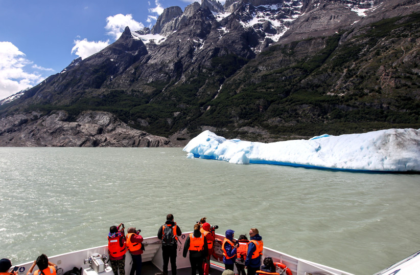 A 2017 photo of tourists at the Torres del Paine National Park in Chile (photo credit: REUTERS)